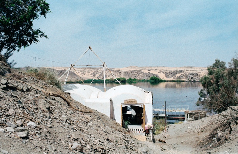 Tekkeya's white domed house on the hillside above the Nile, seen from the path